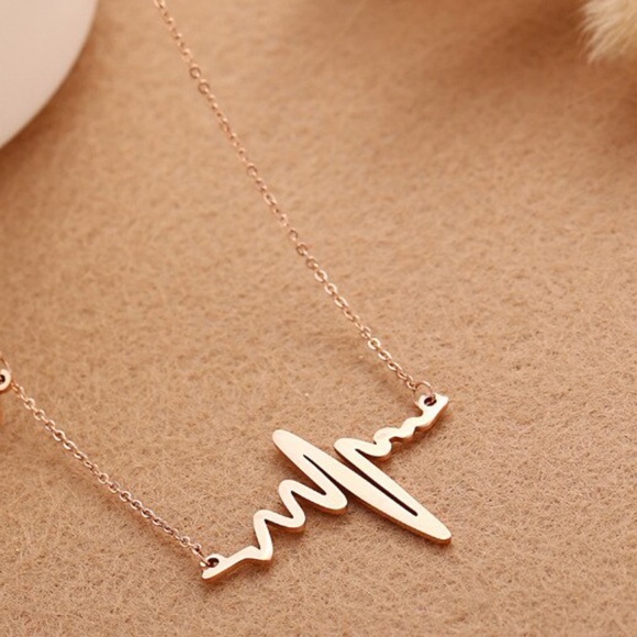 Jewelry - 50% OFF Gold Tone  Wave Heart Necklace Brand New